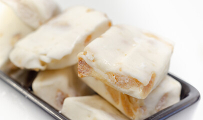 Traditional confections made with sugar or honey, roasted nuts and whipped egg whites