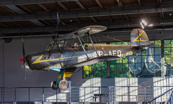 Krak&oacute;w, Poland - October 2, 2021: A picture of the B&uuml;cker B&uuml; 131 B Jungmann small plane inside the main hangar of the Polish Aviation Museum.