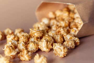popcorn sprinkled from a paper bag close-up