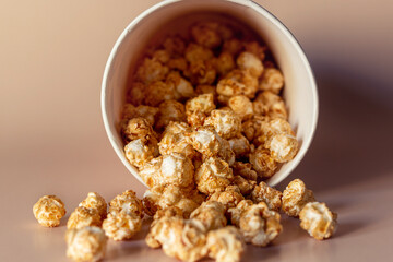 popcorn sprinkled from paper packaging close-up