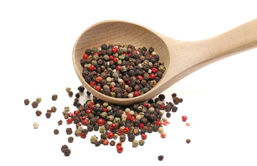Colorful peppercorn mix, pepper pile in wooden spoon isolated on white background 
