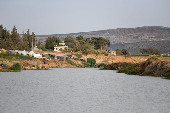 Refugee camps near the Afrin river