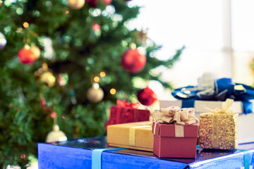 Many gift boxes christmas home decoration in living room,Merry Christmas and Happy new year concept