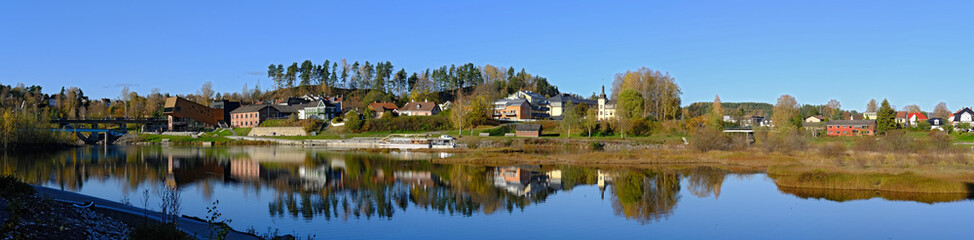 Fototapeta na wymiar Hønefoss river and buildings, Honefoss, Norway