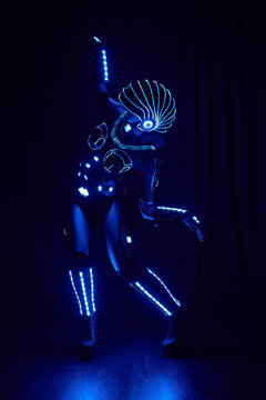 Anonymous person in modern LED costume