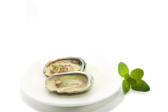 con carambolo traditional raw Mexican sea food composed of sea oysters, chile, lemon, salt and mint, freshness and citrus flavor