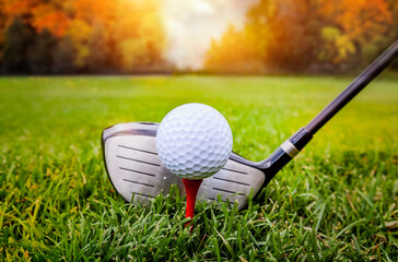 Golf ball and golf club in beautiful golf course at sunset background - 463628347