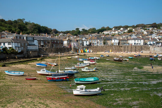 Mousehole, Cornwall, England, UK. 2021.  Mousehole a popular Cornish holiday and fishing resort in southern Cornwall at low tide.