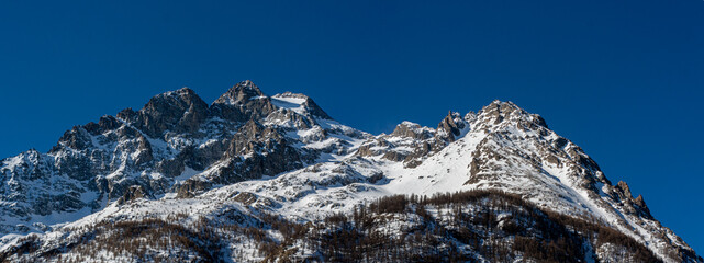 mountain peak snow in Alps nature panorama. Ośnieżona góra w Alpach - obrazy, fototapety, plakaty