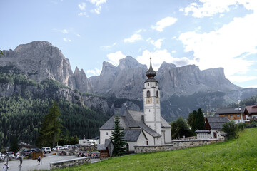 Fototapeta na wymiar Corvara - August: Church St. Vigilius in Colfosco, Dolomites, Italy