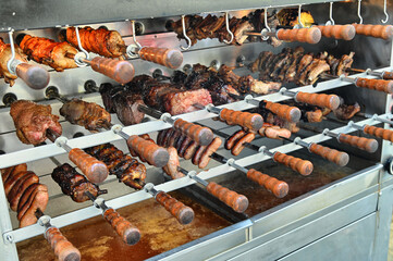 Typical Brazilian churrascaria meat barbeque at a street food fair in Turin, Italy