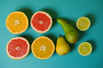 fruits on a blue background. screensaver for computer and website, stylish advertising. presentation of the commercial offer. bright, eye-catching advertising of various promotions. banner. poster