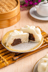 Baozi or Bakpao is a type of yeast-leavened filled bun in various Chinese cuisines. There are many variations in fillings (meat, chocolate) and preparations, though the buns are most often steamed.