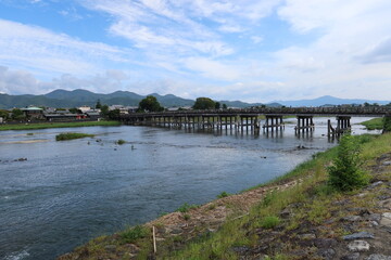 A tourist spot in Kyoto in Japan 日本の京都の観光地 : Togetsu-kyo Bridge and the Oi-gawa（＝Katsura-gawa） River flowing through Arashiyama 
嵐山の渡月橋と大堰川