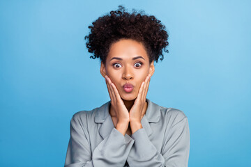 Photo of young lovely black girl have fun send air kiss coquettish isolated over blue color...