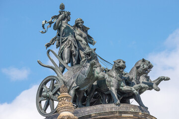 Old statue of Dionis and Aridna quadriga with four panthers on the top of the State Opera House in downtown of Dresden, Germany, details, closeup