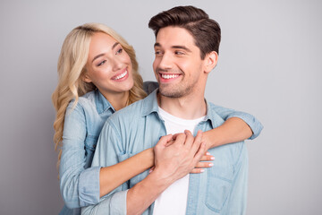 Photo of young couple happy positive smile embrace love feelings spouses isolated over grey color background