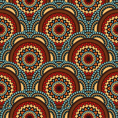 Abstract seamless mandala background. Texture in blue, brown and yellow colors. Oriental pattern for design, fashion print, scrapbooking	