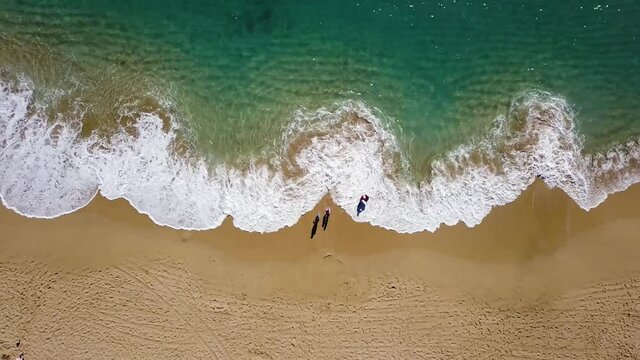 Sand beach with waves (Hawaii)