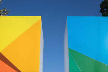 Abstract architecture background. Geometric colored architecture elements with a modern facade. abstract urban modern exterior in yellow and orange colors. Minimalism