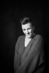 Black and white portrait of a beautiful woman with a short haircut mohawk emotions mood