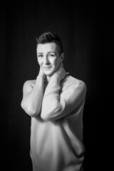 Black and white portrait of a beautiful woman with a short haircut mohawk emotions mood