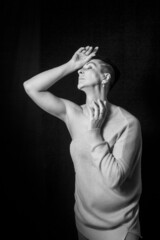 Black and white portrait of a beautiful woman with a short haircut mohawk emotions mood