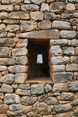 window in stone wall in machupicchu