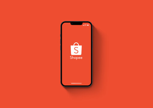 Shopee app on iPhone 13 Pro smartphone screen on orange background. Rio de Janeiro, RJ, Brazil. October 2021