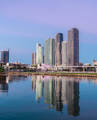 downtown miami skyline skyscrapers colors sky sunrise beautiful cute buildings luxury reflections water sea 