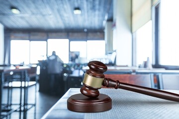 Judges wooden gavel on the desk on background.