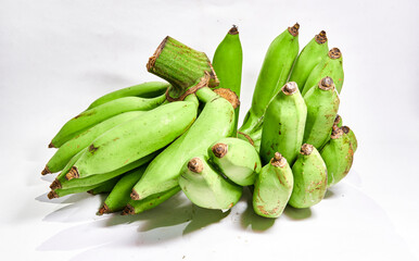 Bunch of fresh green bananas on a white background