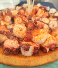 Traditional 'Pulpo a la Gallega'.Boiled octopus on wooden dish,galician typical spanish tapas