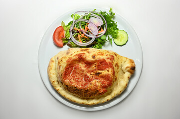 calzone pizza in plates