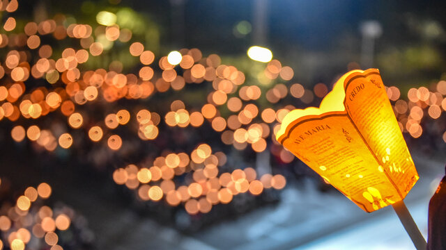Lourdes, France - 9 Oct 2021: A Candlelit torch for the catholic marian processions at the Rosary Basilica in Lourdes