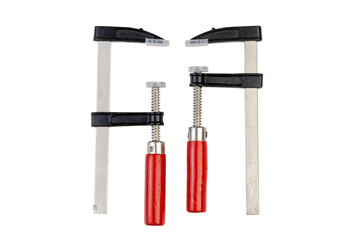Two carpentry clamps with red wooden handles isolated on white background with a clipping path.