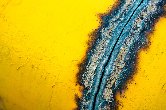 Utilization and recycling of metal. cut autogen metal pipe yellow. Seam on steel pipe for gasification. background with copy space