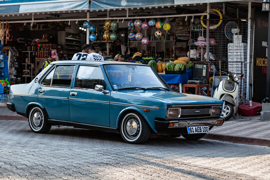 Blue car Tofas Dogan in the city street.