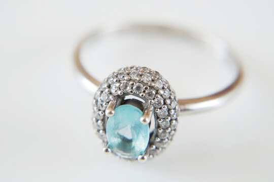 ring with  blue topaz and white diamonds around, jewerly shop, pawnshop concept