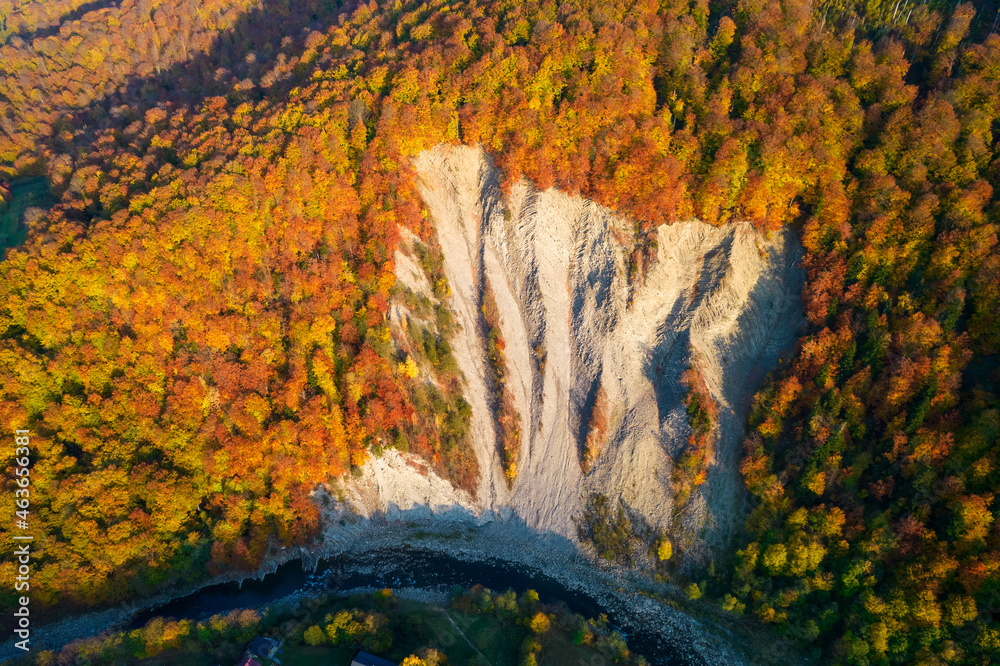 Canvas Prints Aerial view of the huge elephant  rock in carpathian mountains at sunset. Colorful autumn aerial view. Aerial photo of mountains and trees colored into fall colors in small town Yaremche, Ukraine