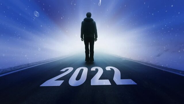  Digital year 2022 with a man on the road.