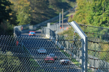 Fototapeta premium Security fence on german racing circuit Nürburgring Nordschleife - Stockphoto