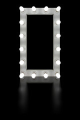 Vintage white mirror frame with glowing lamps, isolated on black background. Make-up mirror with built-in lamps. Professional luminous mirror with reflection.