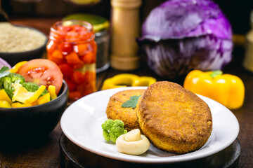 homemade vegan burger made with carrots and quinoa and rice flour, homemade vegan food, healthy snack