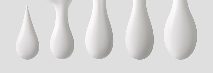 drop of milk isolated on white background.