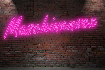 Neon BDSM Fucking Machines (in german Maschinensex) lettering on Brick Wall at night