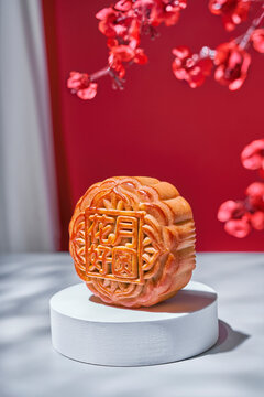 Tasty mooncake on white stand