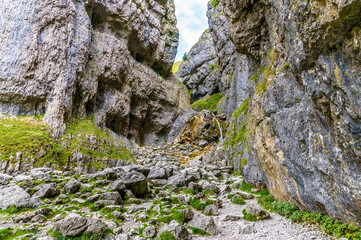 A view looking up the gorge at Gordale Scar Yorkshire in summertime