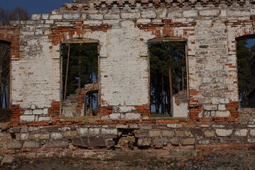 Fototapeta na wymiar An old, abandoned, crumbling house. In the last century it was the home of a merchant or landowner.