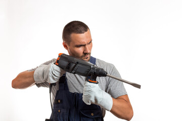 A man in robo-like clothes holds a hand punch, ready to work, on a white background.